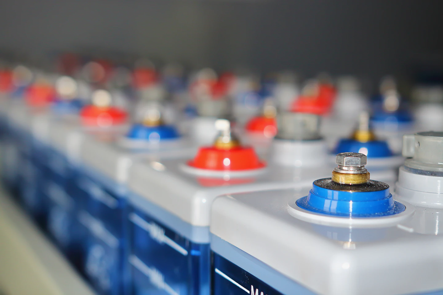 Rows of industrial batteries for stationary energy storage