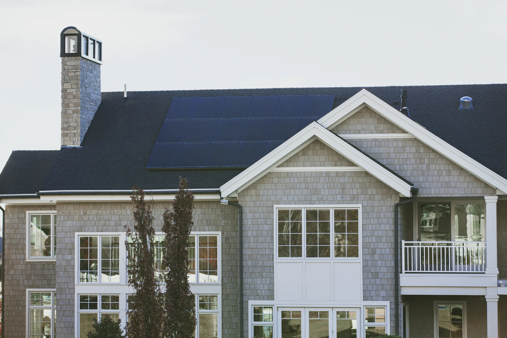 Rooftop solar panels on a coastal home